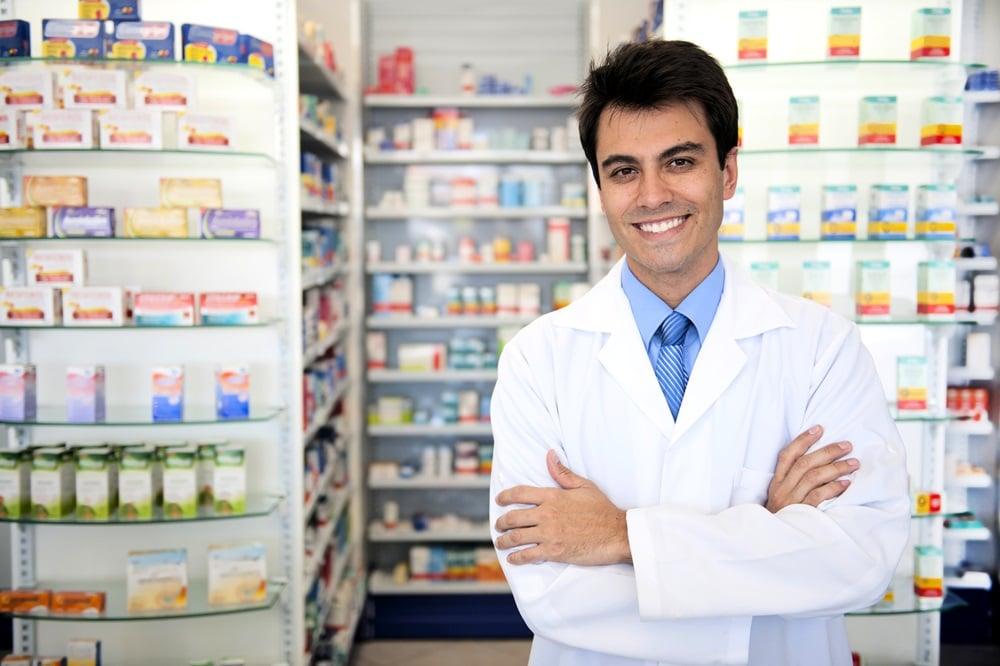 Male pharmacist at the pharmacy.
